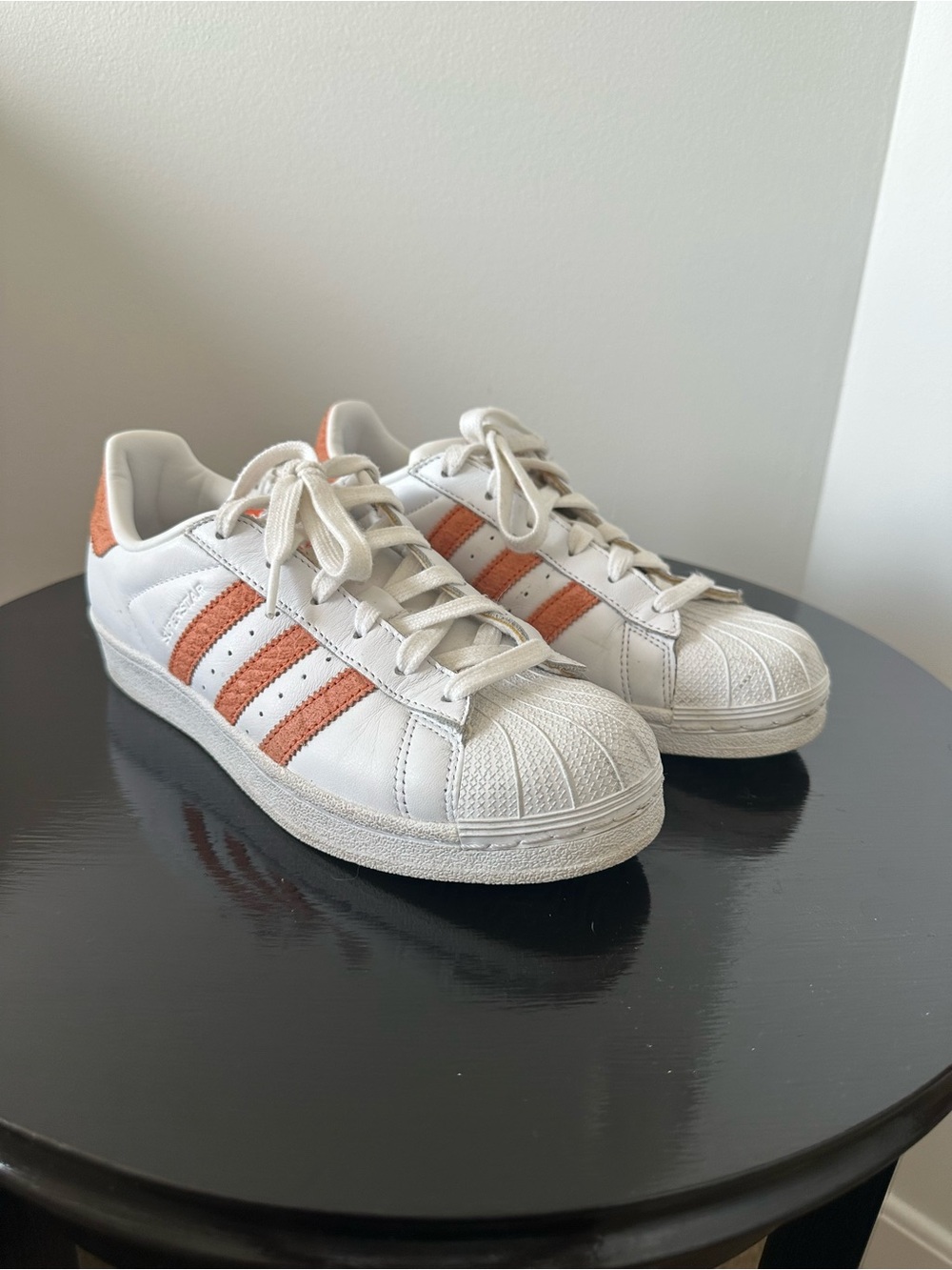 adidas White Superstar Sneakers with Orange Stripes